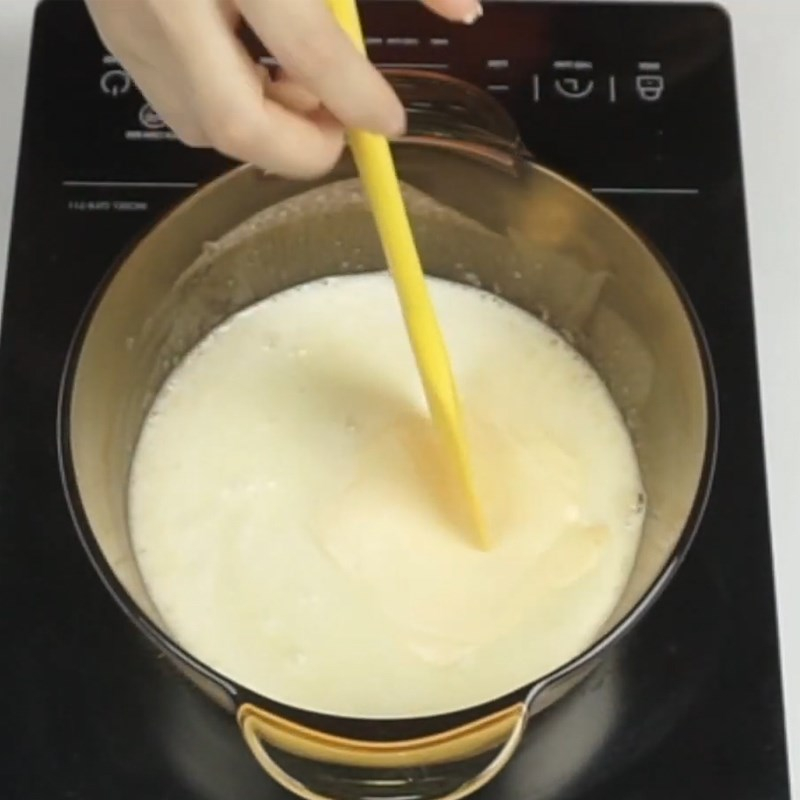Stir in whipping cream, newspaper, and cheddar cheese.