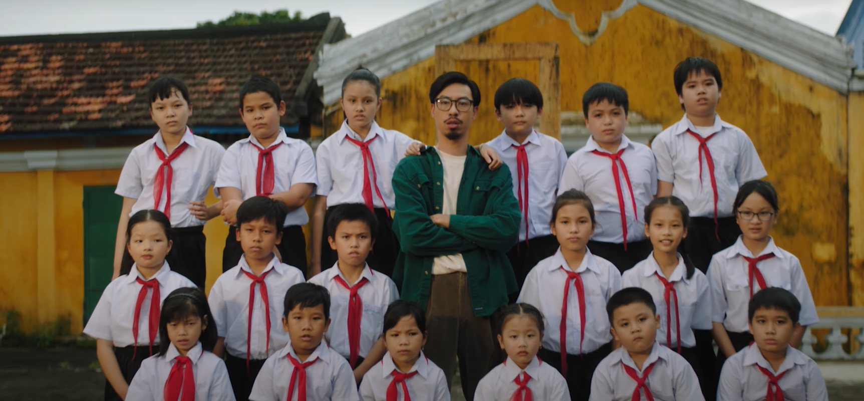 Den Vau and students in Tam Thanh Bich Hoa village
