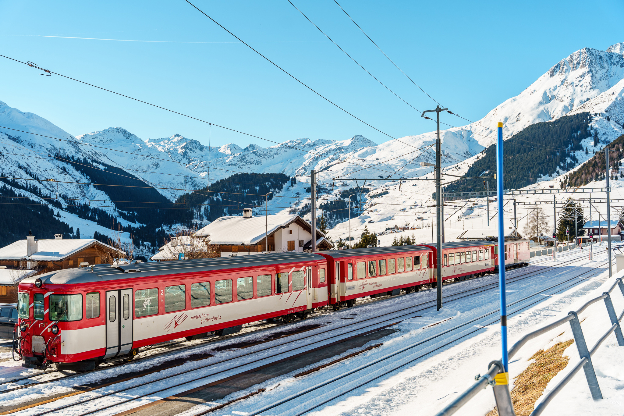 Train waiting at the station in Sedrun